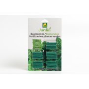 Bastoncitos fertilizantes plantas verdes